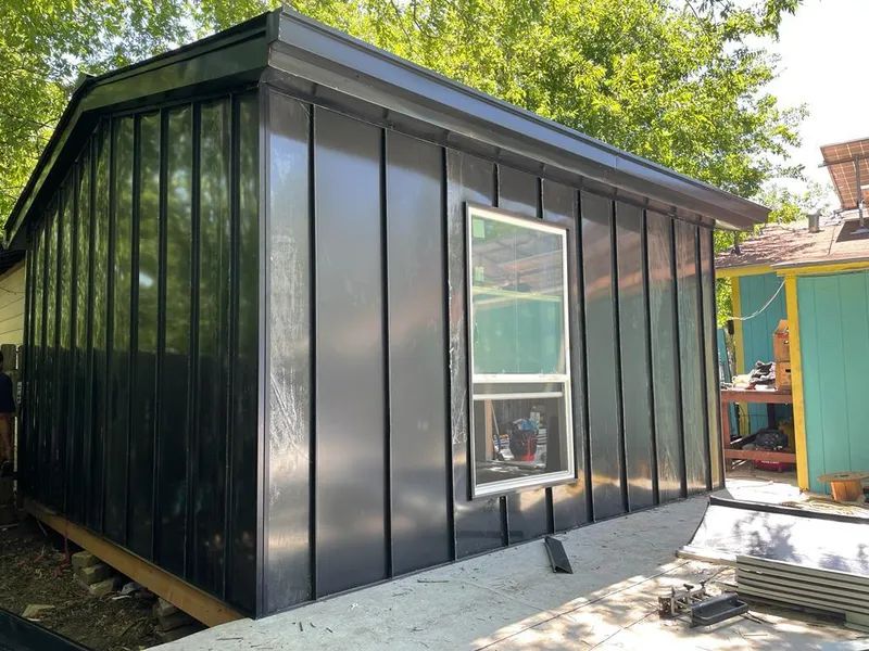 Black standing seam metal wall panels for Metal Roof Installation in Cottage Grove