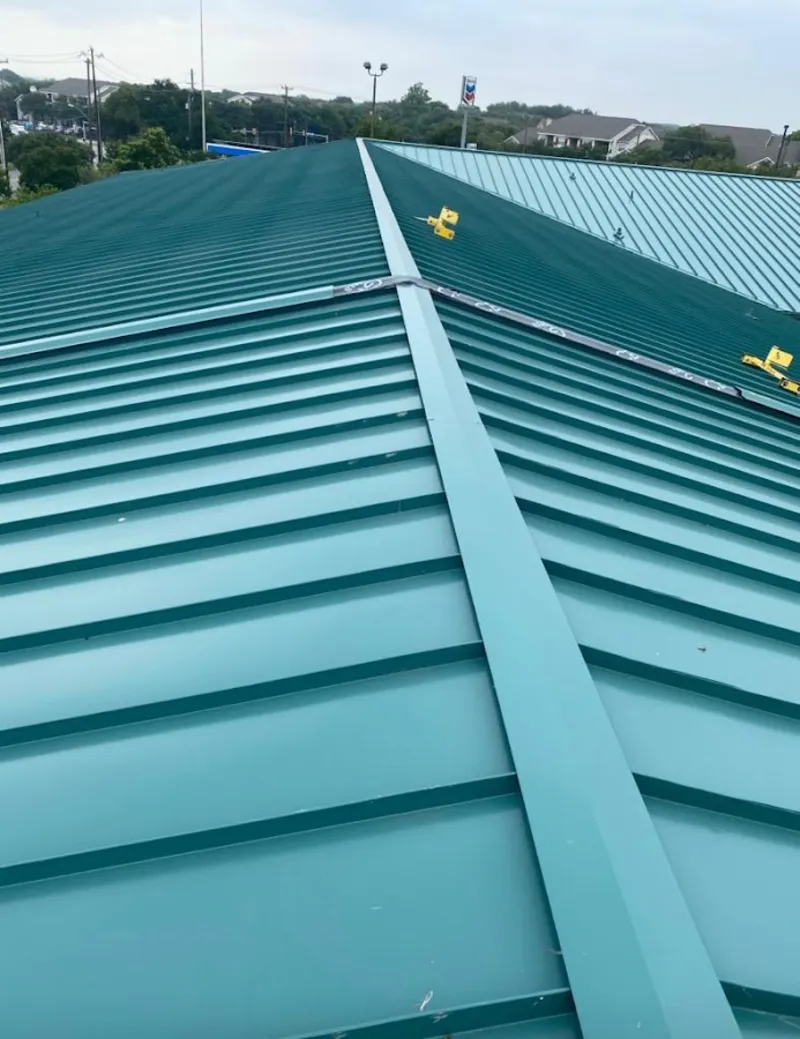 Green commercial metal roof ridge and valley for Metal Roof Repair in Cottage Grove