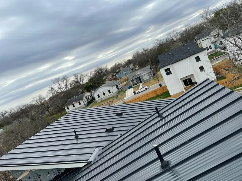 Standing seam metal roof panels with vents for Skylight Repair in Cottage Grove